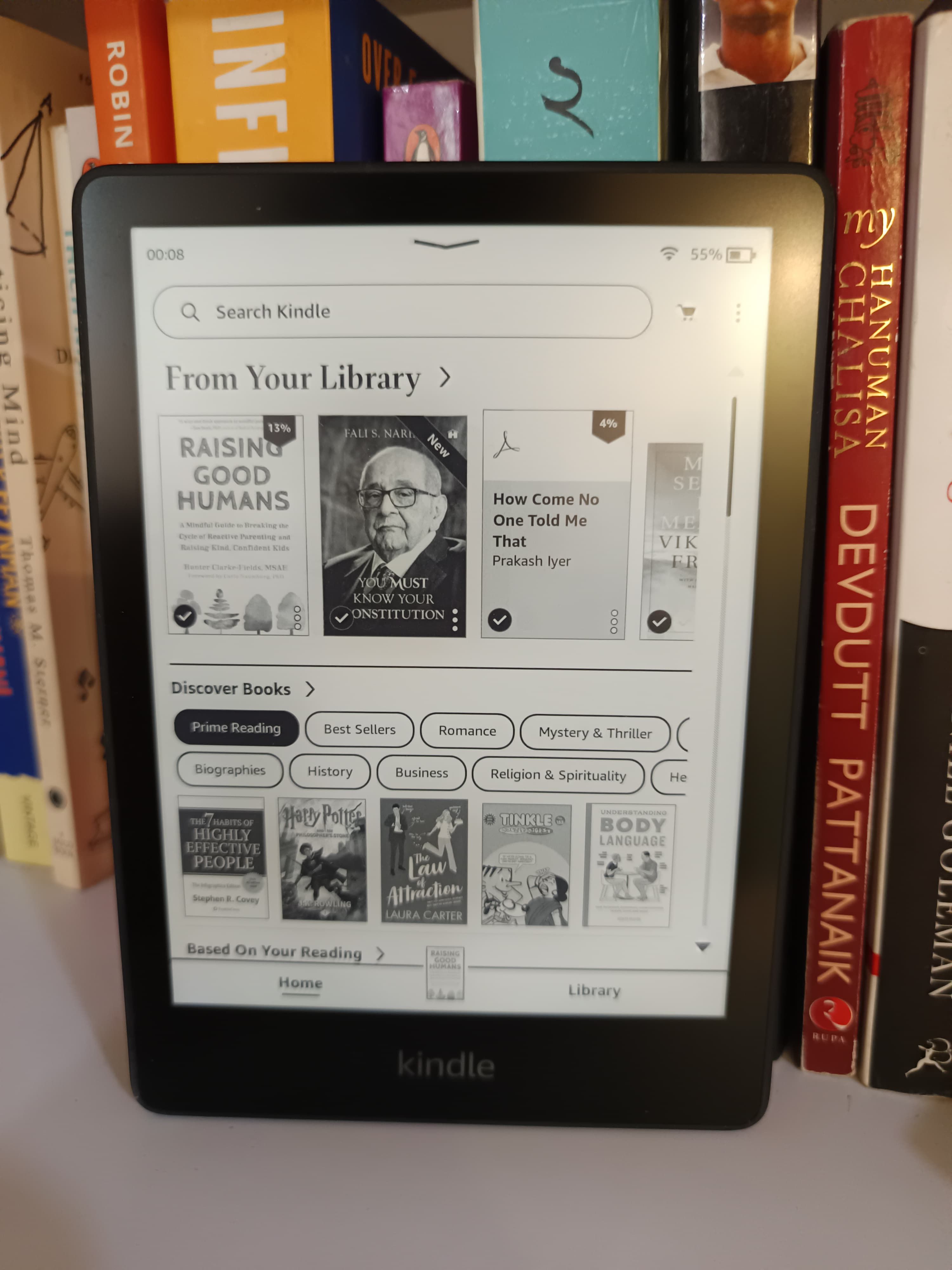 Kindle on a Bookshelf